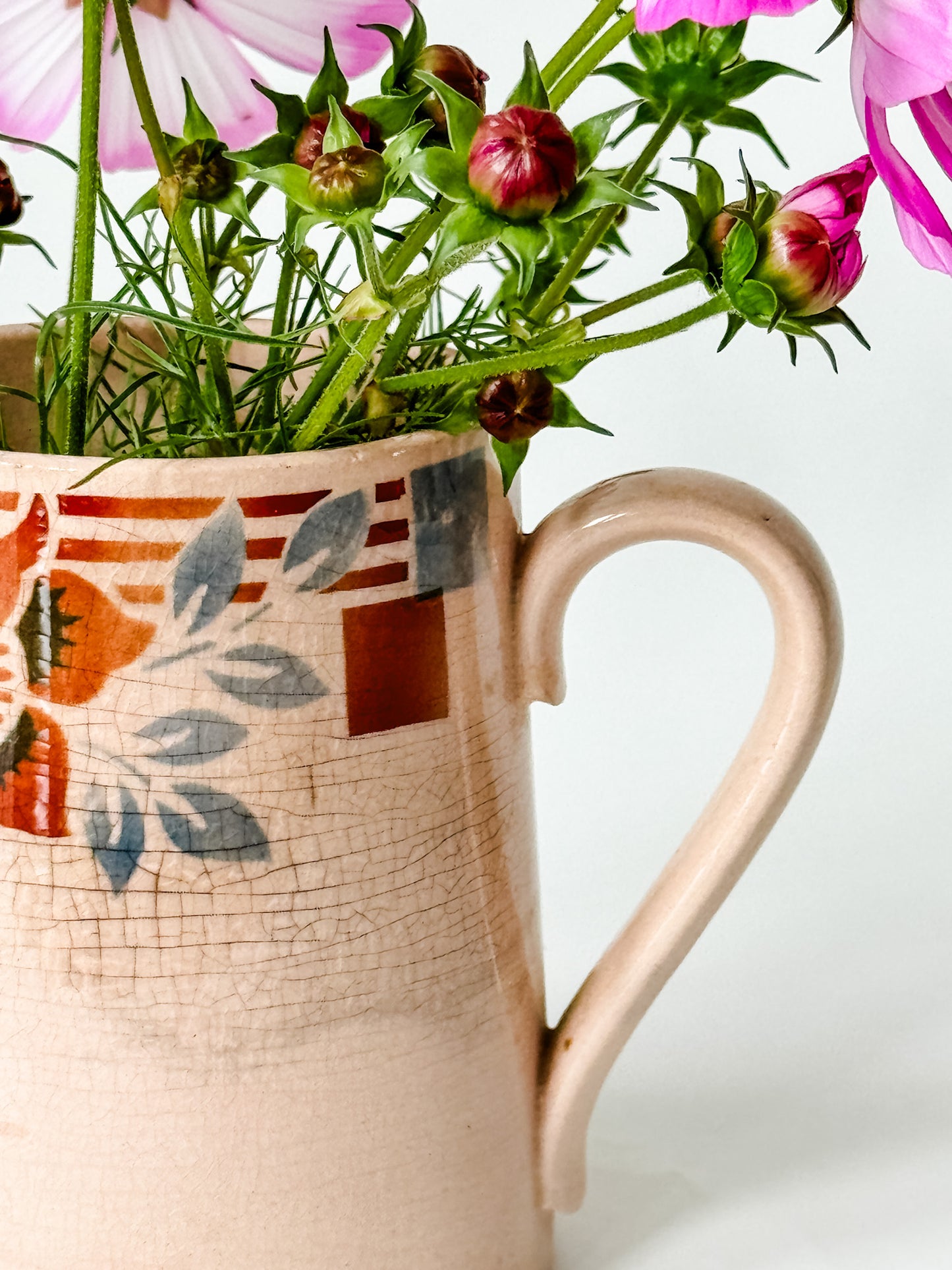 Small Pitcher With Blue and Rust Flowers and Rust Stripes