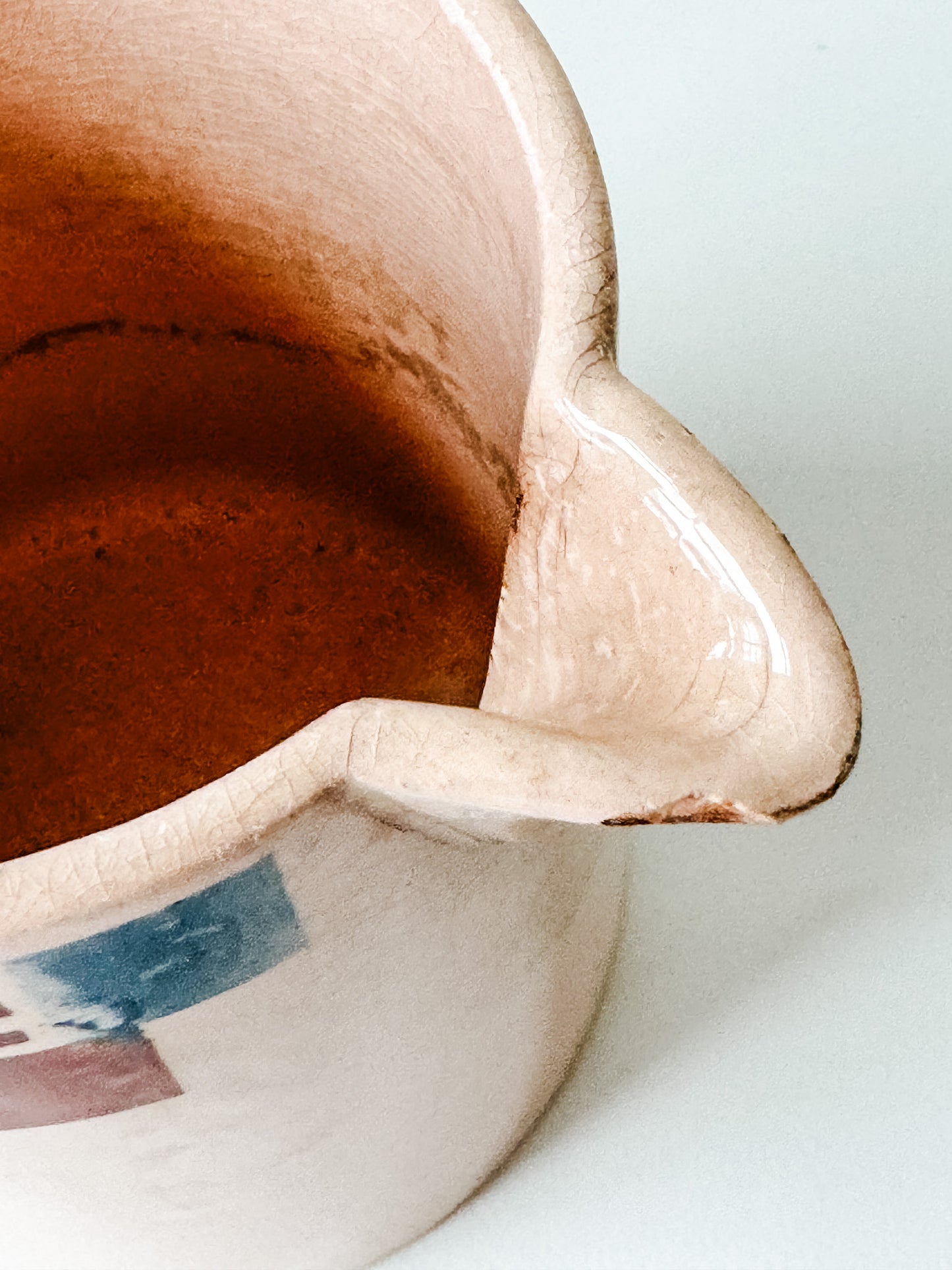 Small Pitcher With Blue and Rust Flowers and Rust Stripes