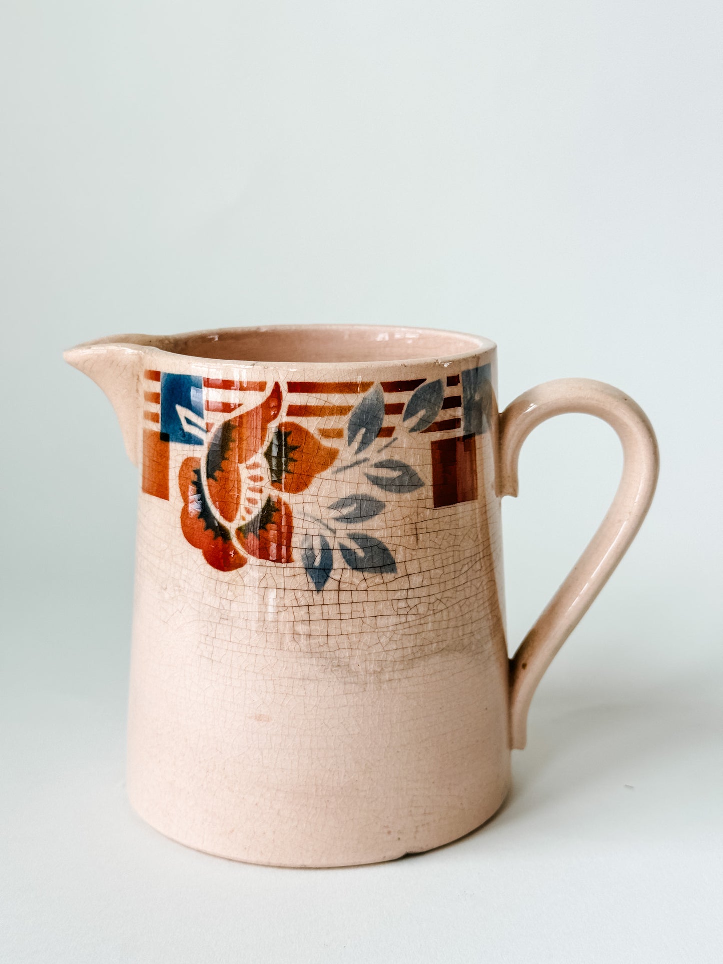 Small Pitcher With Blue and Rust Flowers and Rust Stripes