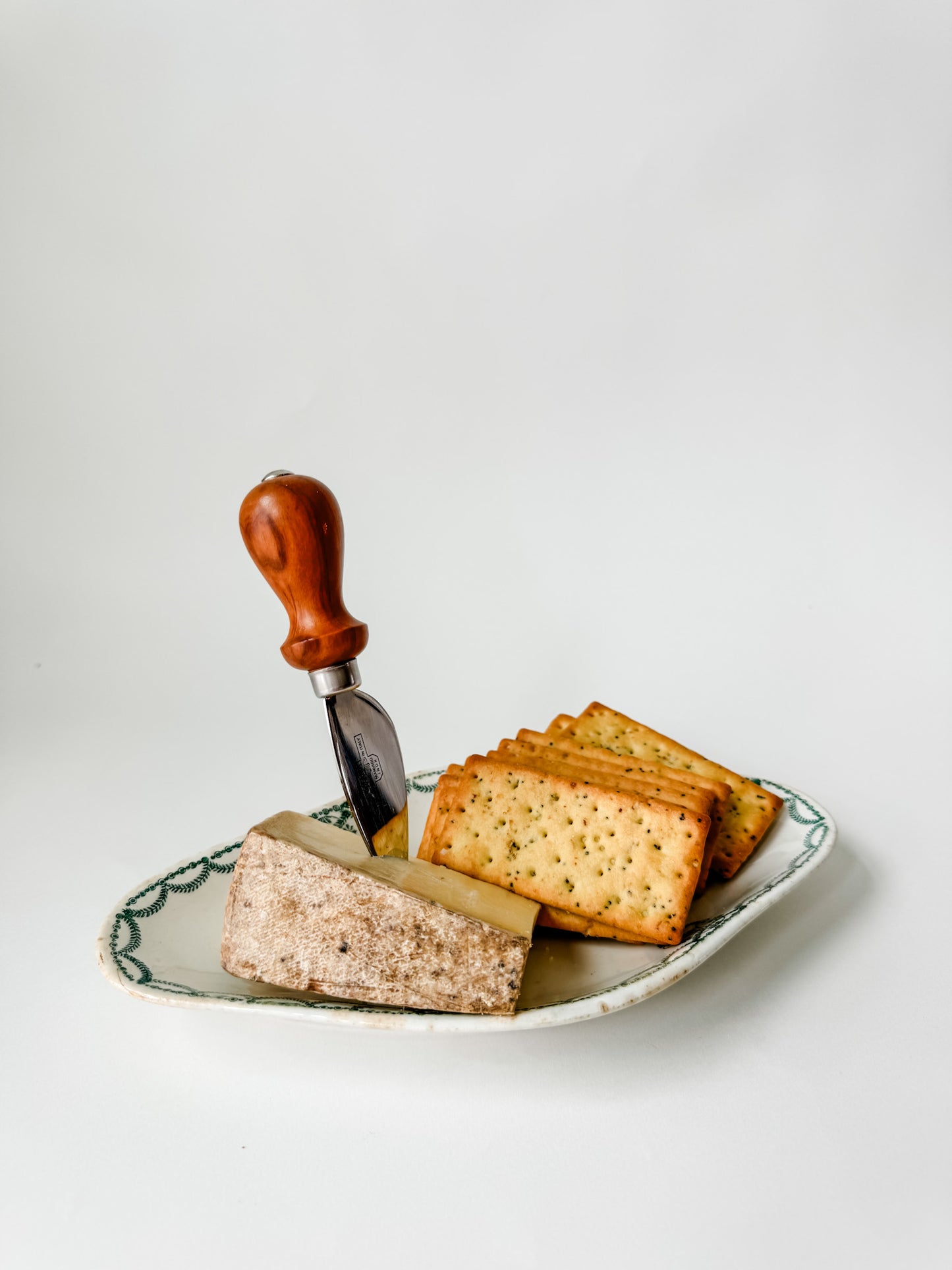 Small Oval French Plate With Green Design Around the Edges